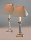 A PAIR OF VICTORIAN SILVER CANDLESTICKS, IN GEORGE III STYLE, FITTED FOR ELECTRIC LIGHT