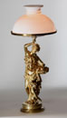 A FRENCH GILT BRONZE FIGURAL TABLE LAMP REPRESENTING AUTUMN, AFTER ALBERT ERNEST CARRIER-BELLEUSE (1824-1887)
