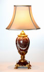 A FRENCH ORMOLU MOUNTED ROUGE MARBLE LAMP BASE, IN LOUIS XV1 STYLE, FITTED FOR ELECTRIC LIGHT
