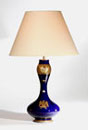 A LIMOGES PORCELAIN VASE, IN EMPIRE STYLE, ADAPTED AS A TABLE LAMP